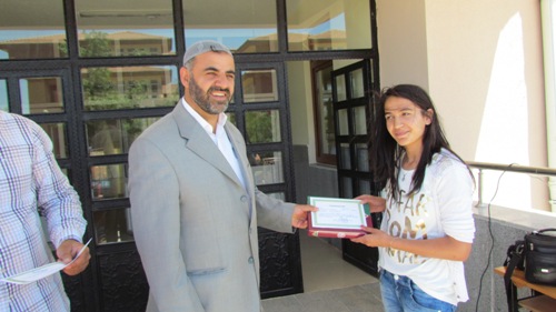 SİVEREKTE ÖĞRENCİLERE 300 KURANI KERİM DAĞITILDI