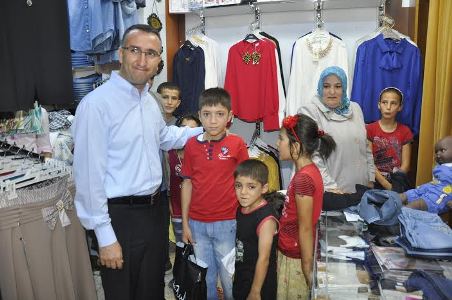 SİVEREK'TE YETİMLERE BAYRAMLIK SEVİNCİ