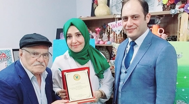 Aymaz'dan Baydilli'ye teşekkür plaketi